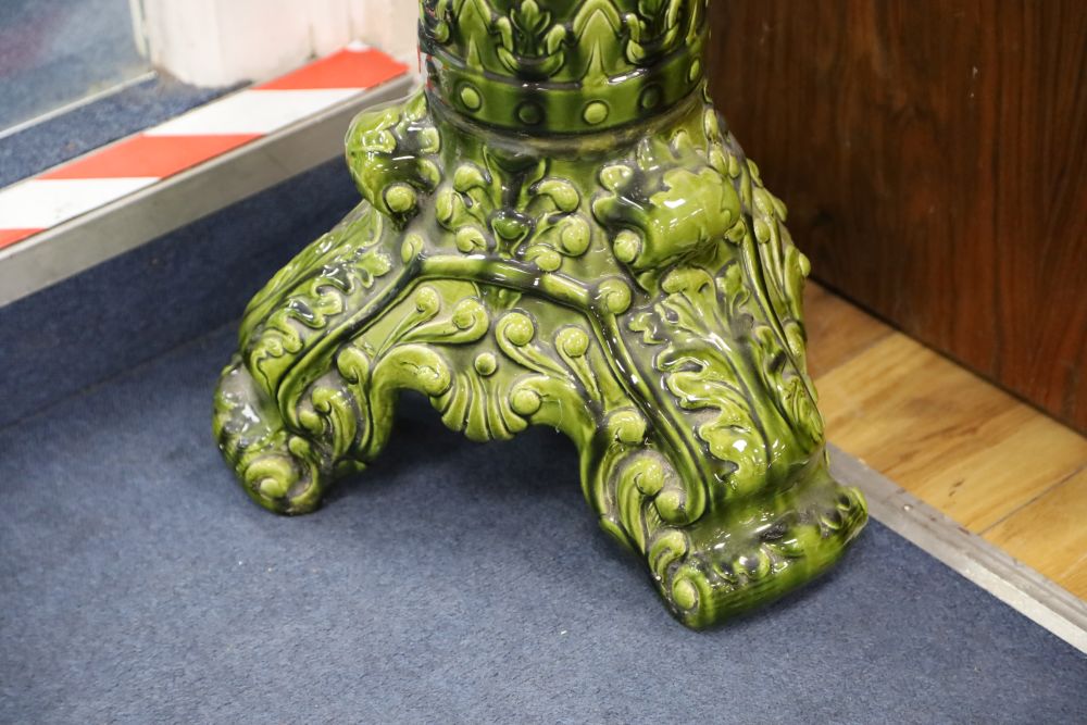 An apple green-glazed majolica jardiniere on matching stand with acanthus and other foliate moulding